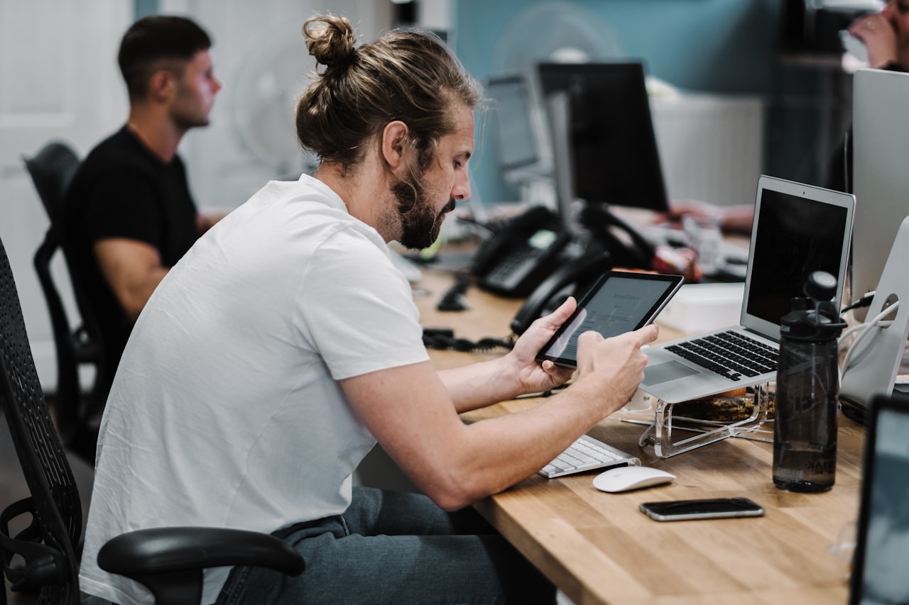 A freelancer at work — in 2026, AI skills are the most in-demand thing on the freelance market. (Photo: Studio Republic / Unsplash)